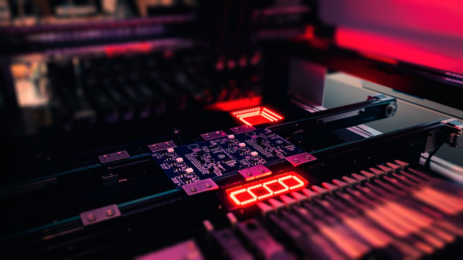 DJ controller with mapping labels and a laptop running Mixxx